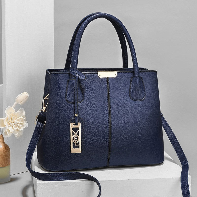 One-shoulder Crossbody Iron Pendant Decorative Large Capacity Handbag Dark Blue Infinite Avenue